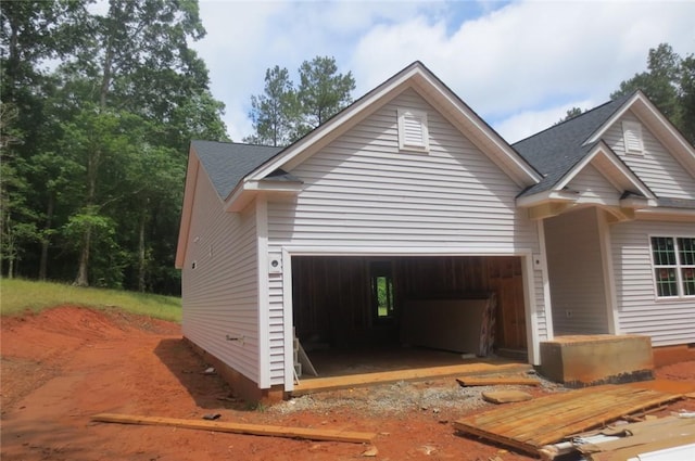 118 Lakeside Dr, Anderson, SC 29621 - view of front of home featuring an attached garage and a shingled roof