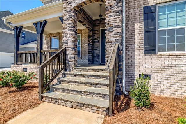 740 Enoree River Pl, Greer, SC 29651 - view of exterior entry with covered porch and brick siding