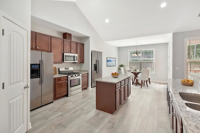 618 Motor Boat Way, Seneca, SC 29672 - kitchen with stainless steel appliances, light wood-type flooring, a center island, pendant lighting, and high vaulted ceiling