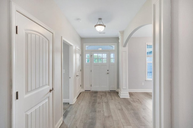 618 Motor Boat Way, Seneca, SC 29672 - entrance foyer featuring arched walkways and light wood-style flooring