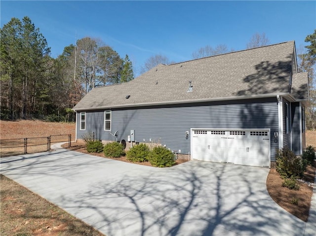 618 Motor Boat Way, Seneca, SC 29672 - rear view of property with a shingled roof and driveway