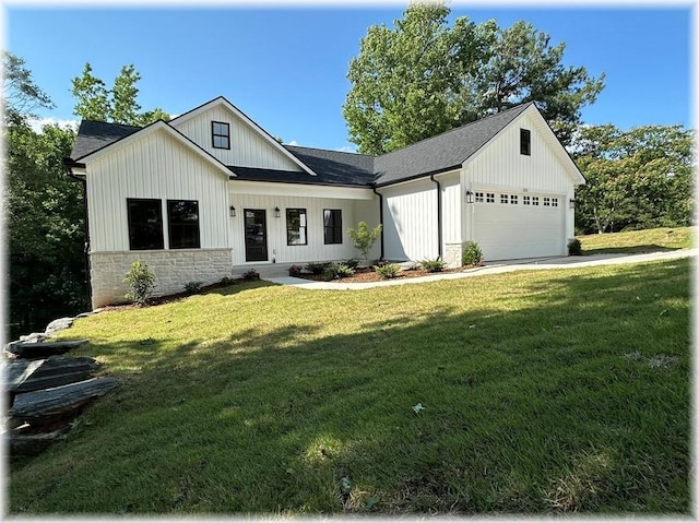 333 Ravens View Dr, Seneca, SC 29678 - modern farmhouse style home featuring a front yard, an attached garage, stone siding, board and batten siding, and a shingled roof