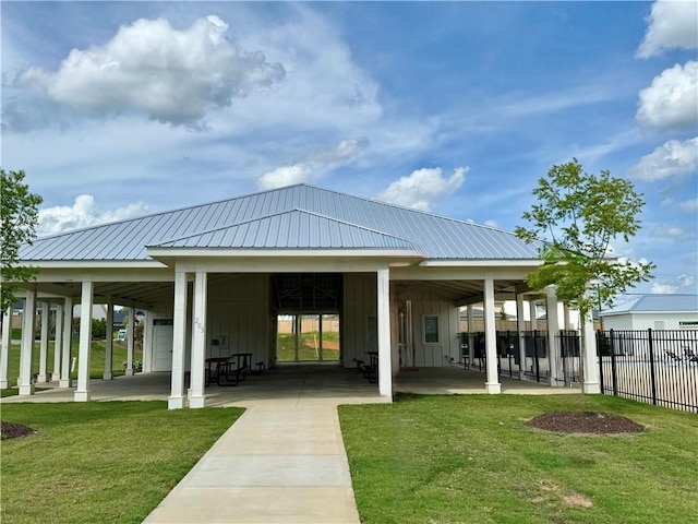 104 Laurel Oak Dr, Anderson, SC 29621 - back of house with board and batten siding, a metal roof, and a patio area