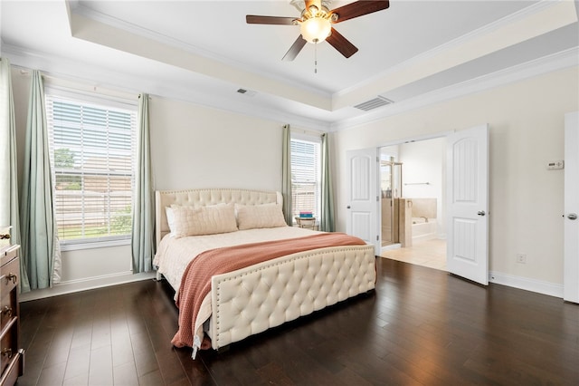 100 Dartford Ct, Easley, SC 29642 - bedroom featuring a raised ceiling, hardwood / wood-style flooring, multiple windows, crown molding, and ensuite bath