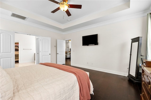 100 Dartford Ct, Easley, SC 29642 - bedroom with a raised ceiling, dark wood-style floors, crown molding, and a ceiling fan