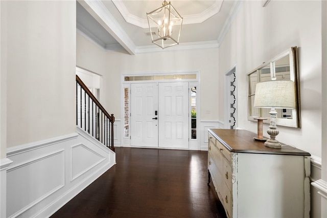 100 Dartford Ct, Easley, SC 29642 - entryway featuring a chandelier, crown molding, a decorative wall, stairway, and wainscoting