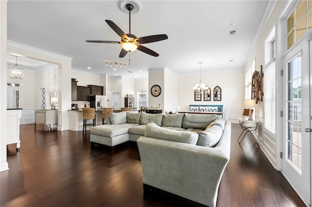 100 Dartford Ct, Easley, SC 29642 - living area featuring a chandelier, healthy amount of natural light, a ceiling fan, dark wood-type flooring, and crown molding