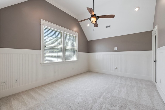 1219 Old Mill Rd, Easley, SC 29642 - carpeted spare room with a ceiling fan, vaulted ceiling, a wainscoted wall, and recessed lighting