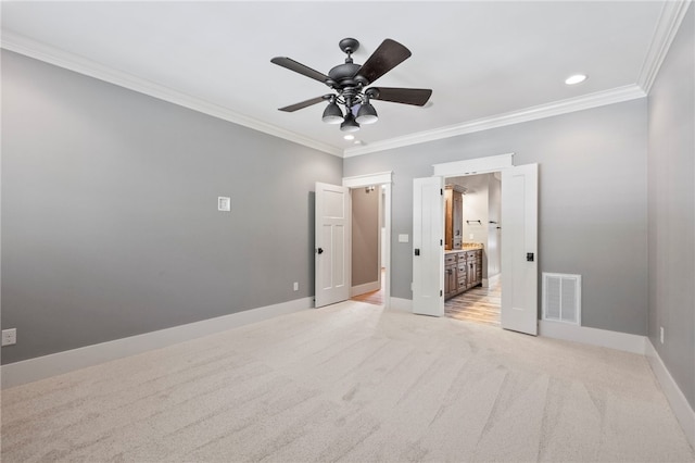 1219 Old Mill Rd, Easley, SC 29642 - unfurnished bedroom featuring crown molding, light colored carpet, recessed lighting, ensuite bathroom, and ceiling fan