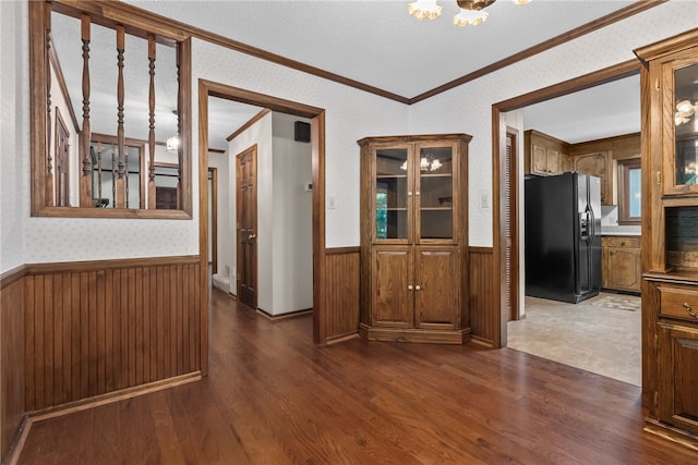 320 Whitfield Dr, Pendleton, SC 29670 - hall featuring a wainscoted wall, a chandelier, dark wood-style flooring, crown molding, and wallpapered walls