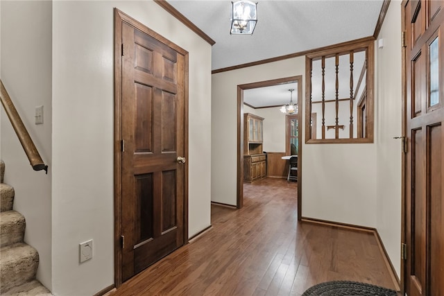 320 Whitfield Dr, Pendleton, SC 29670 - entryway with crown molding, hardwood / wood-style floors, stairway, and a chandelier