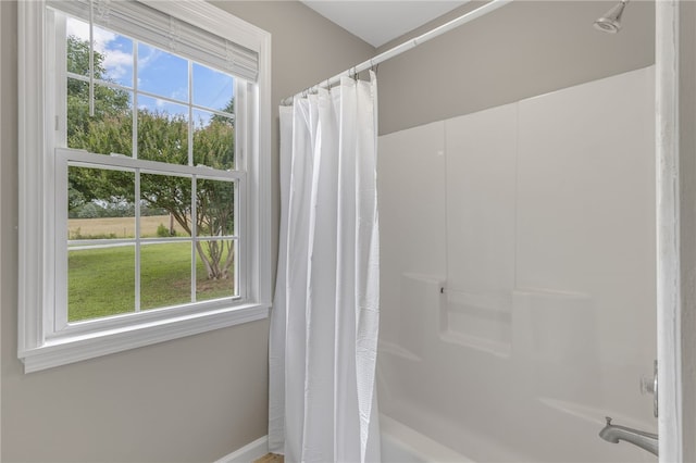 1330 Grove Rd, Anderson, SC 29621 - bathroom with plenty of natural light and shower / bath combo with shower curtain