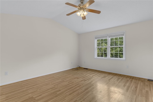 1330 Grove Rd, Anderson, SC 29621 - empty room featuring vaulted ceiling, light wood-style flooring, and ceiling fan