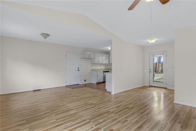 1330 Grove Rd, Anderson, SC 29621 - unfurnished living room with light wood finished floors, a ceiling fan, and vaulted ceiling