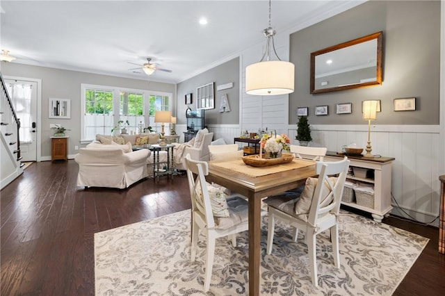 245 Thomas Green Blvd, Clemson, SC 29631 - dining area with crown molding, stairway, ceiling fan, wainscoting, and dark wood-style flooring