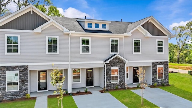 217 Islay Way, Anderson, SC 29621 - view of front facade with stone siding, board and batten siding, and a front yard