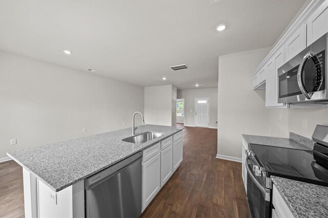 217 Islay Way, Anderson, SC 29621 - kitchen featuring stainless steel appliances, an island with sink, light stone counters, dark wood finished floors, and recessed lighting