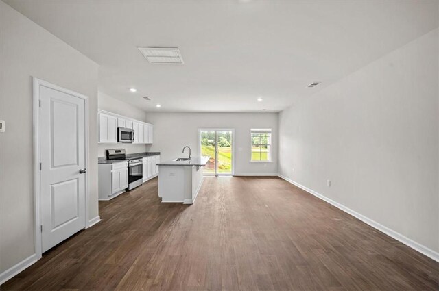 217 Islay Way, Anderson, SC 29621 - unfurnished living room with dark wood-style floors, stairs, and recessed lighting