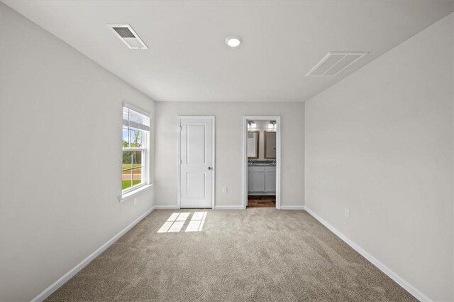 217 Islay Way, Anderson, SC 29621 - unfurnished bedroom with carpet floors and connected bathroom