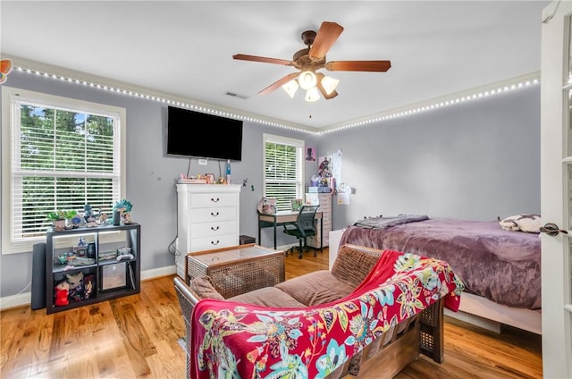 911 Devenger Rd, Greer, SC 29650 - bedroom with wood finished floors and ceiling fan