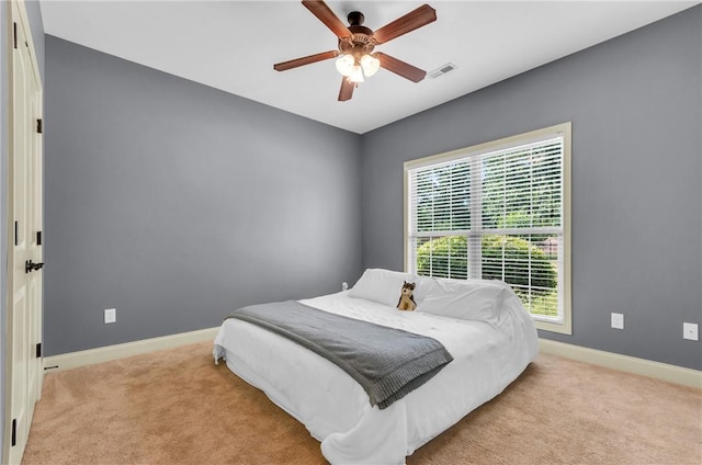 911 Devenger Rd, Greer, SC 29650 - bedroom with light colored carpet and ceiling fan