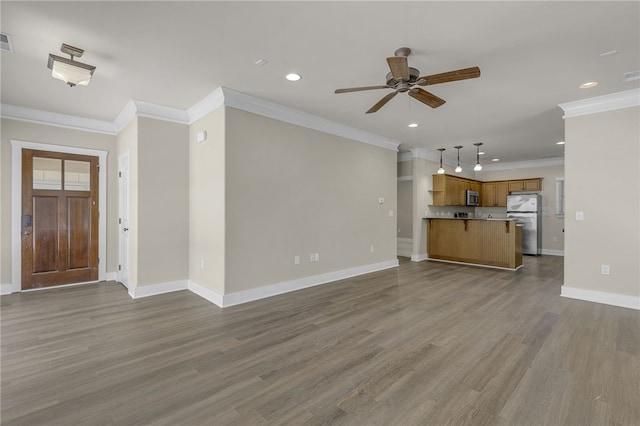 101 W Ln Unit 1117, Clemson, SC 29631 - unfurnished living room featuring ornamental molding, recessed lighting, a ceiling fan, and wood finished floors