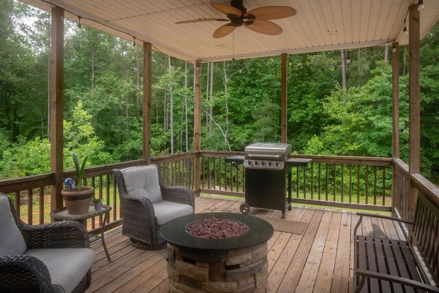 190 Edward Ln, Walhalla, SC 29691 - wooden terrace with area for grilling, a ceiling fan, an outdoor fire pit, and a wooded view