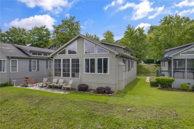 1230 Melton Rd # 64, West Union, SC 29696 - back of house featuring a sunroom, a patio, and a lawn