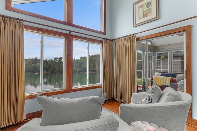 1230 Melton Rd # 64, West Union, SC 29696 - sunroom with healthy amount of natural light, wood finished floors, and a water view