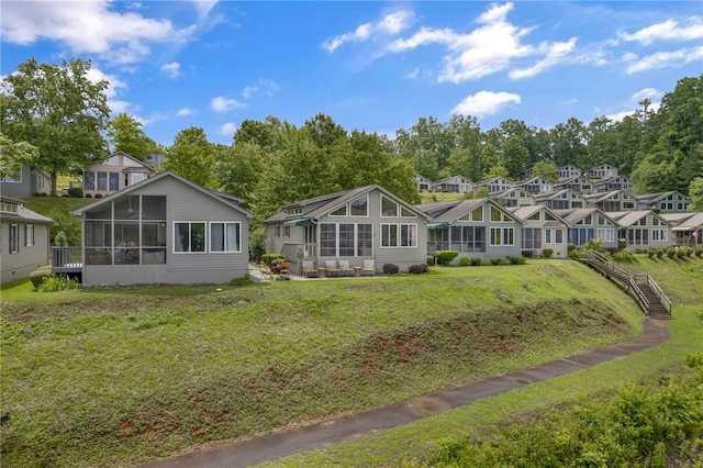 1230 Melton Rd # 64, West Union, SC 29696 - rear view of property featuring a sunroom and a lawn