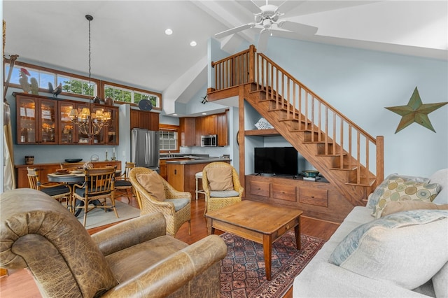1230 Melton Rd # 64, West Union, SC 29696 - living area with high vaulted ceiling, wood finished floors, stairs, a chandelier, and a ceiling fan