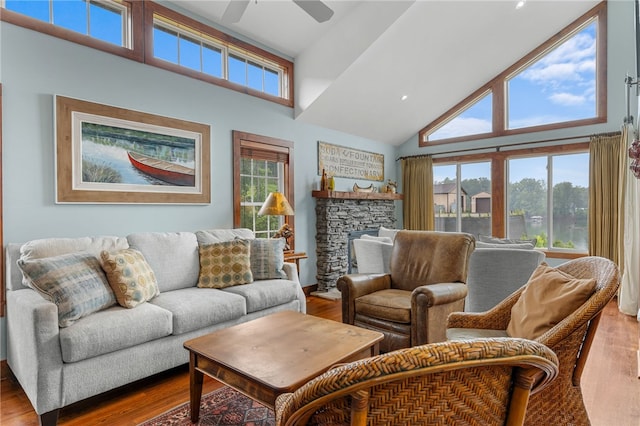 1230 Melton Rd # 64, West Union, SC 29696 - living room featuring high vaulted ceiling, wood finished floors, ceiling fan, and a stone fireplace