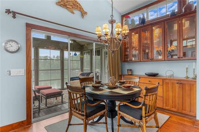 1230 Melton Rd # 64, West Union, SC 29696 - dining space featuring light wood-style flooring and a chandelier