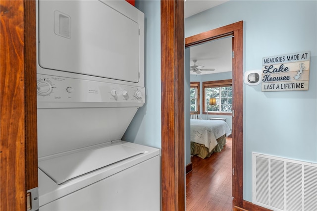 1230 Melton Rd # 64, West Union, SC 29696 - laundry area featuring stacked washer / drying machine, wood finished floors, and ceiling fan