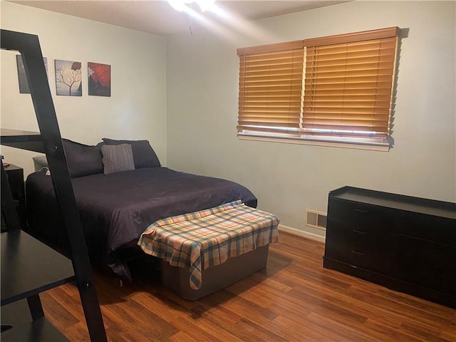 1573 John Dodd Rd, Spartanburg, SC 29303 - bedroom with wood finished floors and baseboards