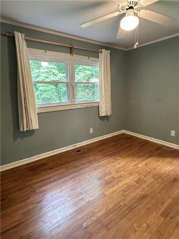 114 Bonnie Brae Ln, Walhalla, SC 29691 - empty room featuring crown molding, wood-type flooring, and a ceiling fan