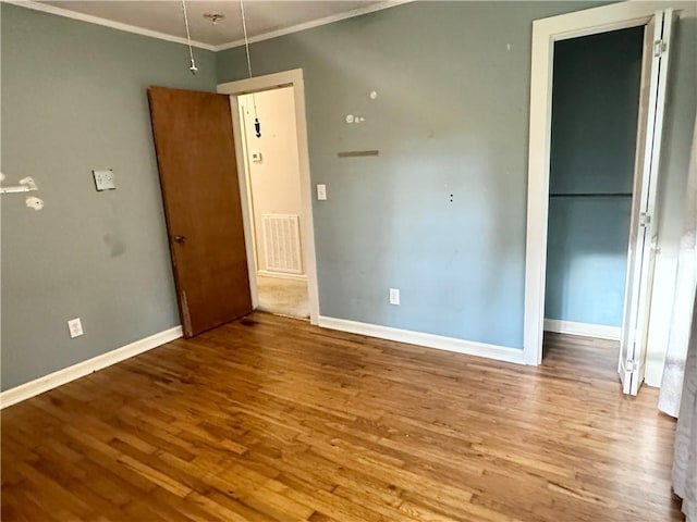 114 Bonnie Brae Ln, Walhalla, SC 29691 - unfurnished bedroom featuring wood finished floors and crown molding