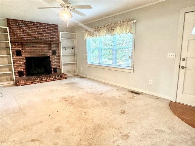 114 Bonnie Brae Ln, Walhalla, SC 29691 - unfurnished living room with built in shelves, a brick fireplace, and ceiling fan