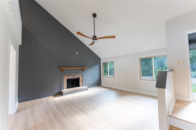 913 Berkeley Dr, Clemson, SC 29631 - unfurnished living room featuring high vaulted ceiling, a ceiling fan, a fireplace, plenty of natural light, and light wood-type flooring