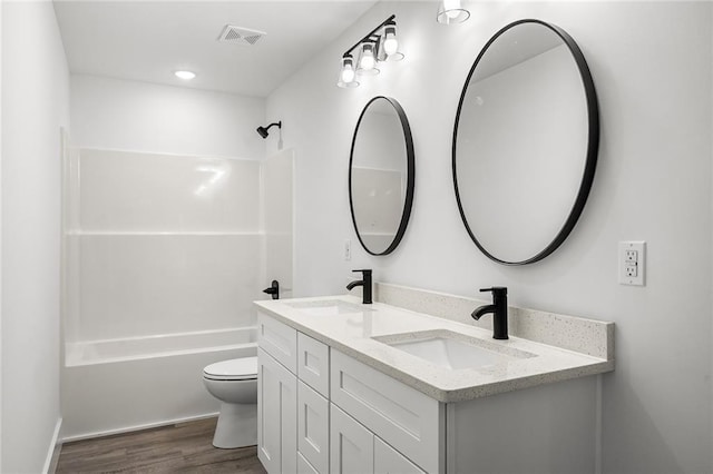 114 Hillcrest Cir, Anderson, SC 29624 - full bath with double vanity, wood finished floors, and shower / bathtub combination