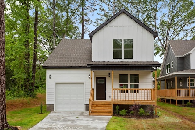 114 Hillcrest Cir, Anderson, SC 29624 - view of front of home featuring a porch, a garage, board and batten siding, concrete driveway, and a shingled roof