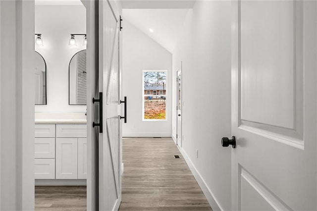114 Hillcrest Cir, Anderson, SC 29624 - hallway featuring lofted ceiling and light wood-type flooring