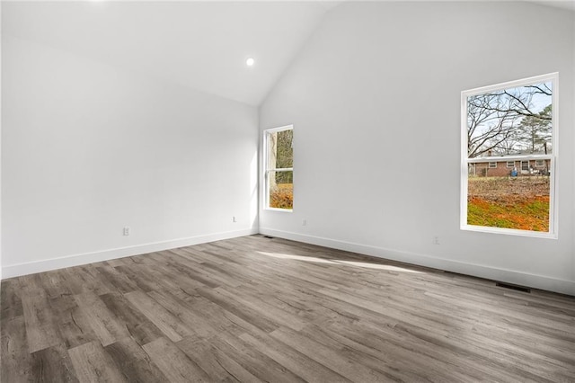 114 Hillcrest Cir, Anderson, SC 29624 - unfurnished room featuring high vaulted ceiling, plenty of natural light, wood finished floors, and recessed lighting