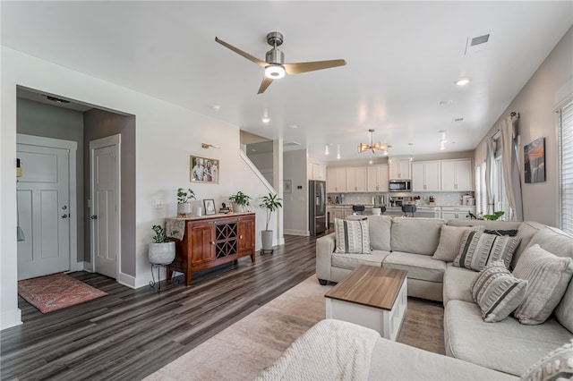 210 Obsidian Ct, Simpsonville, SC 29680 - living area featuring dark wood-style flooring, a chandelier, ceiling fan, and recessed lighting