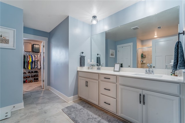 210 Obsidian Ct, Simpsonville, SC 29680 - full bathroom with double vanity, a stall shower, and a spacious closet