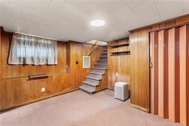503 Burris St, Anderson, SC 29625 - below grade area featuring wooden walls, light colored carpet, and stairway