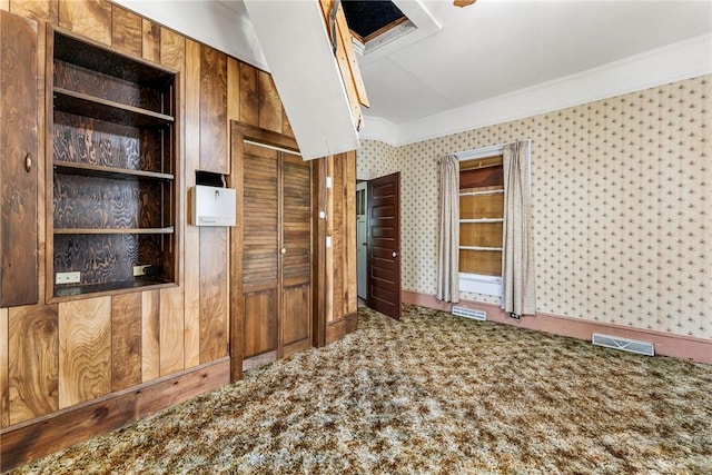 503 Burris St, Anderson, SC 29625 - empty room featuring crown molding, wallpapered walls, and carpet floors
