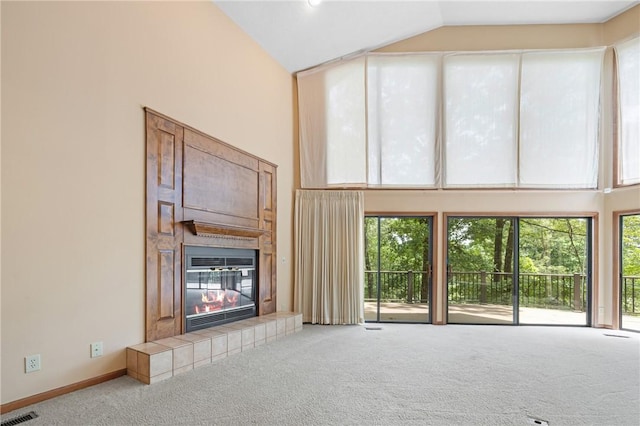 14 Windlass Ct, Salem, SC 29676 - unfurnished living room with carpet, high vaulted ceiling, and a tiled fireplace
