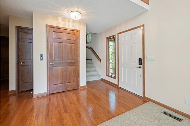 14 Windlass Ct, Salem, SC 29676 - foyer entrance with stairway and wood finished floors