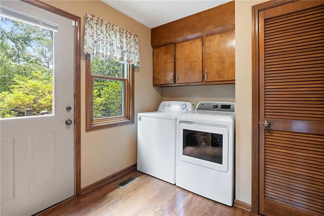 14 Windlass Ct, Salem, SC 29676 - washroom with cabinet space, washer and dryer, and light wood-style floors